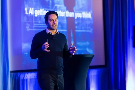 Shiv Singh delivering a keynote on AI